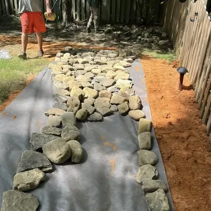 Front lawn striping at Oxford MS farmhouse